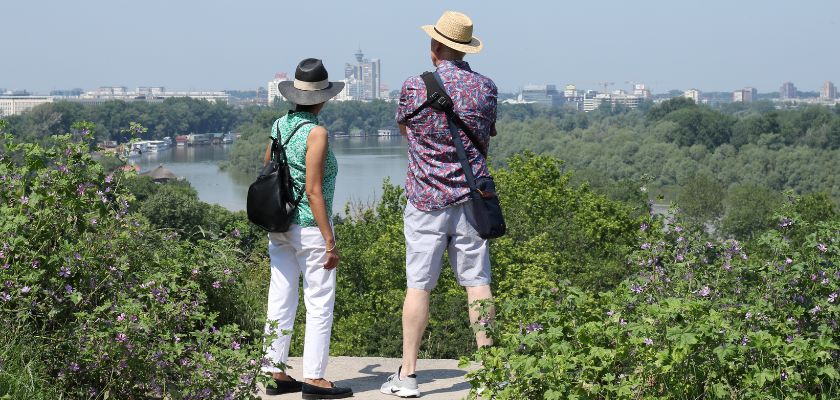 Travelers overlooking the Danube River and Belgrade skyline in Serbia