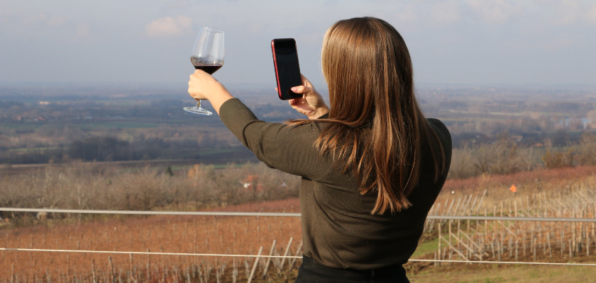 Enjoying Serbian wine with a view of the vineyards