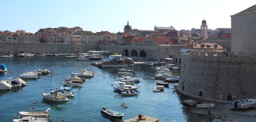 Dubrovnik city walls and Adriatic sea at sunset