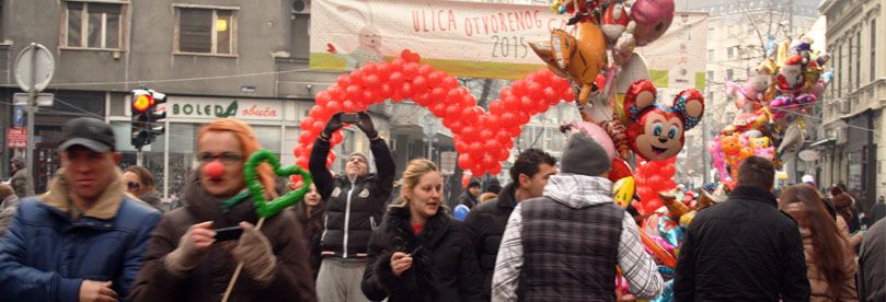 People on the street in Belgrade during the fest street of open heart