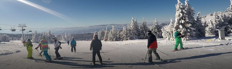 Group of skiers enjoy skiing at Kopaonik