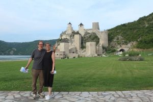 Couple of people in front of the Golubac fortress.