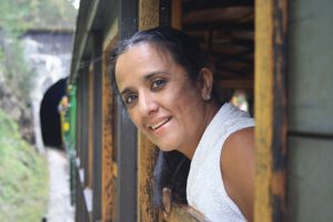 Lady on her Balkans tour is captured during the ride with Sargan Eight train.