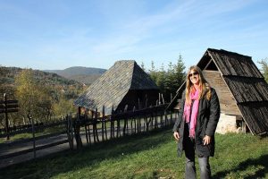 Lady is posing in Sirogojno during her Serbia holiday package
