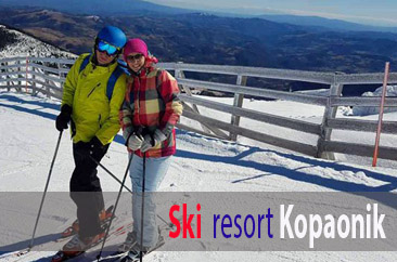 Two skiers on the trail at ski resort Kopaonik