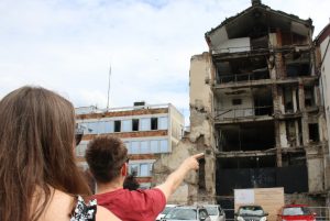 Visitors in front of the bombed RTS building